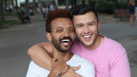 Two men smiling and laughing