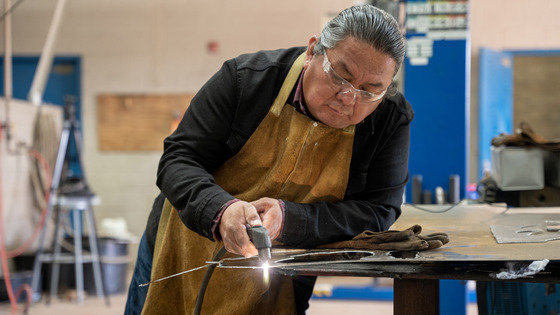 Person works on metal fabrication 