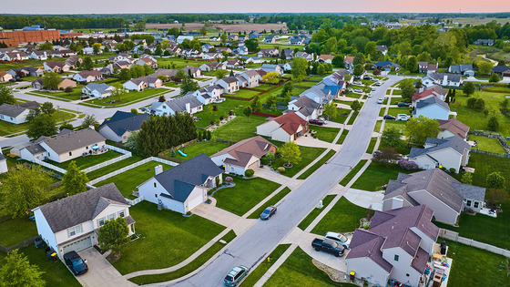 An aerial view of houses in a suburban neighborhood