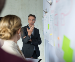 Stock image of people working with data 