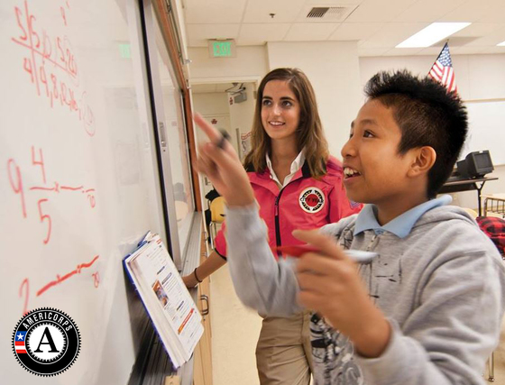 City-Year-AmeriCorps-members-teaches-math-to-a-student
