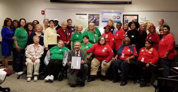 Senior Corps volunteers with canton mayor