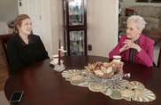 Senior Companion volunteer Mary McCormack (left) visits with Elsie Brenkworth at her Fargo, ND, home. (Photo by Dave Wallis/Forum News Service)