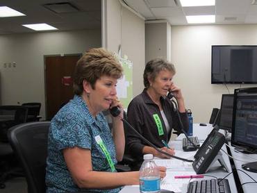RSVP volunteers staff a call center for wildfire survivors needs