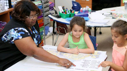 Senior Corps Foster Grandparent tutors students at Oak Grove Elementary in Hillsborough County Florida.