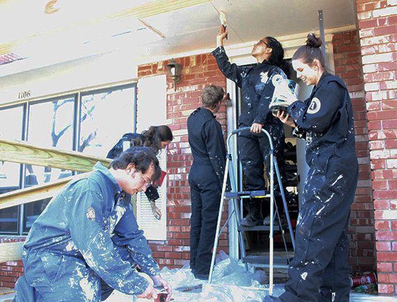 AmeriCorps NCCC members do paint and home repair with Habitat For Humanity in Tahqualah, OK.