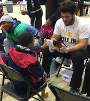 Samaritan's Feet distributed 500 pairs of shoes during an MLK Day of Service event in Pine Bluff, Arkansas.