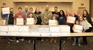 Volunteers with the Love A Michigan Vet Project recently packed gift boxes for soldiers overseas at the University of Michigan-Dearborn.