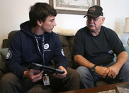 FEMA Corps AmeriCorps member Nicholas Palacios with Bruce Goodwill Nov. 10 in Lynn Haven (Photo by Patti Blake/The News Herald)