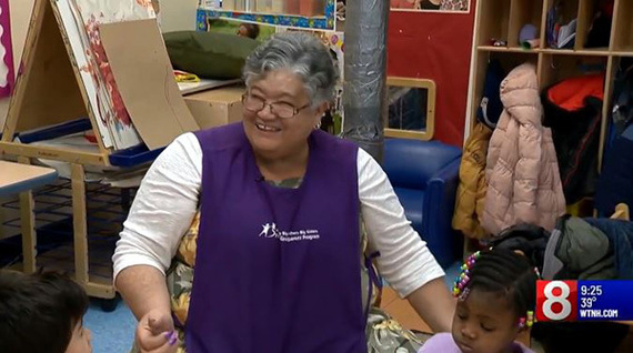 Foster Grandparent Isabel Guzman works with preschool children in Hartford, Connecticut.