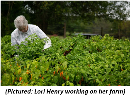 Lori Henry working on her farm