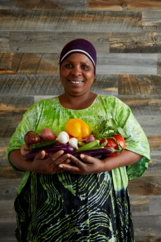 Lady holding produce