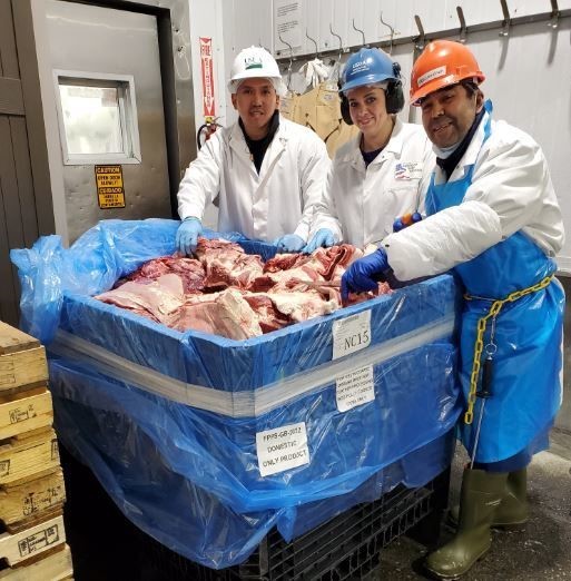 federal employees conducting a Boneless Beef quality check for Federal Purchase Program Specification Coarse Ground Beef