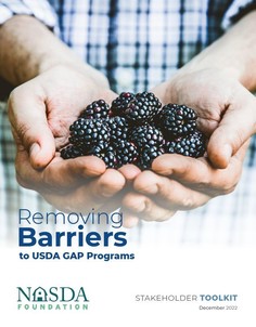 Removing Barriers to USDA GAP Programs Stakeholder Toolkit front page with a man holding blackberries