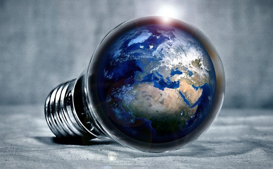 Graphic that shows the planet Earth in the shape of a lightbulb.