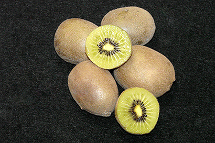 Whole and sliced kiwifruit