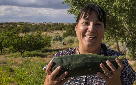 Native woman demonstrates and promotes indigenous agricultural methods