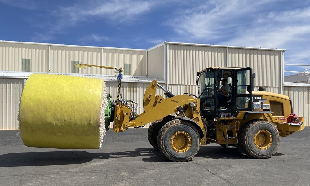 Loader with plastic-wrapped module