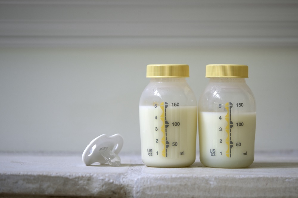 2 bottles of pumped human milk. (Getty stock photo)