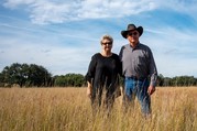 ranchers-in-tall-grass