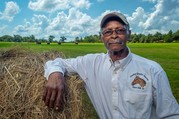 man with haybale