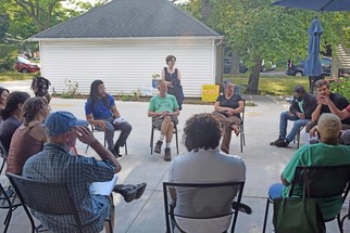 District Conservationist Di'Shun Melbert facilitates a discussion with Grand Rapids urban farmers during a meeting held at New City Partners.