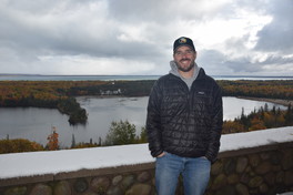 Bay Mills Indian Community employee Frank Zomer at an overlook above Spectacle Lake where the tribe planted wild rice.