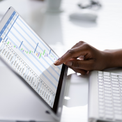 Person entering information on a computer