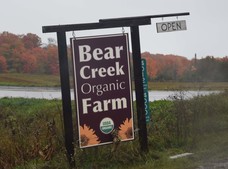 Sign for Bear Creek Organic Farm outside of Petoskey