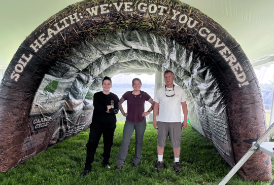 NRCS staff member April Dean, Crystal Lavin & Jim Turenne setup our Soil Health Tunnel for the Newport Stopover of The Ocean Race!
