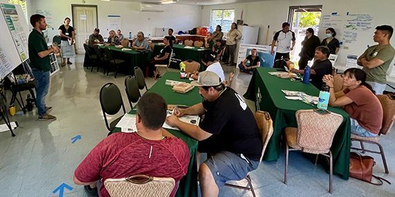 Zachery Freeman, NRCS PIA Honolulu Field Office district conservationist, speaks to a group of local O’ahu farmers.