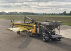 A plane is loaded with cover crop seed at the Lenawee County Airport in Adrian. Photo provided by the Lenawee Conservation District