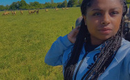 Royalty ID student Kaily Wright at an elk farm in Genesee County.