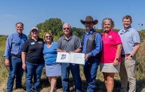 Photo of FSA Administrator, State Department Ag Employees, IN FSA Employees and Landowners at the CREP Signing Event