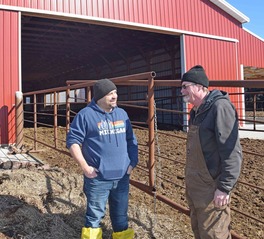NRCS Soil Conservation Technician Greg Lienau and Shiawassee County farm Duane Leach.