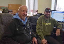 Tony Jandernoa, owner of Meadowbrook Dairy, and his son Kyle.