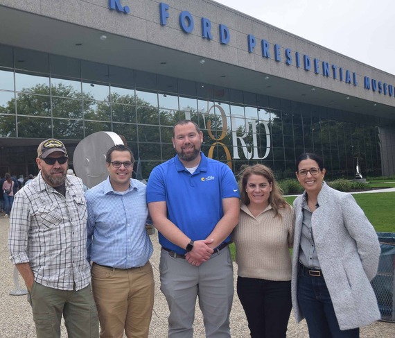 Kelli Evans, NRCS senior advisor for field operations, (far right) on the Grand River in Grand Rapids .