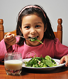 Child-eating-spinach-iS_000010127226-sm.jpg
