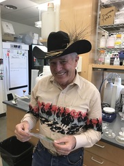 Bob Quinn, farmer from Big Sandy, MT learning about the results of his sample from the extension plant pathology research lab (c. Mary Burrows)