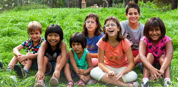 Funding Opportunity for the CYFAR program. Image of children in field courtesy of Adobe Stock.