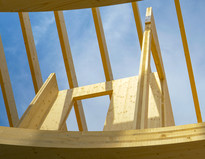 Cross-laminated timber roof beams, courtesy of Adobe Stock.