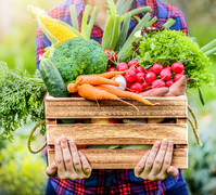 Wooden box full of vegetables, courtesy of Getty Images.