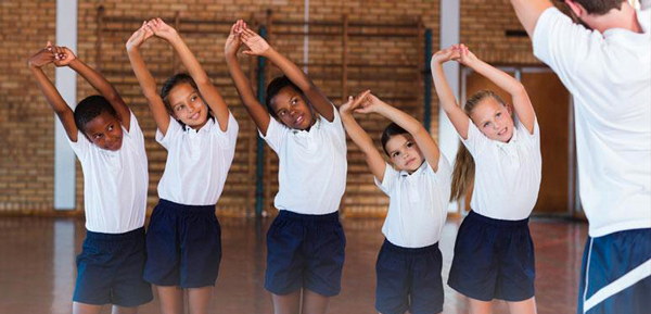 Funding Opportunity: RHSE program. Image of kids exercising courtesy of Adobe Stock.