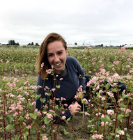 Rachel Breslauer in a field of buckwheat. Photo courtesy of Washington State University.