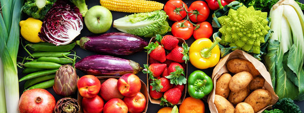Assortment of fresh organic fruits and vegetables, courtesy of Getty Images.