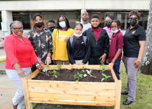 Dr. Karleah Harris and UAPB undergraduate students helped students at Jack Robey Junior High School set up a vegetable garden, courtesy of UAPB.