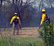 Crew members monitor a prescribed fire at the Arboretum at Penn State, courtesy of The Arboretum at Penn State.