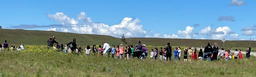 A large group of students get ready to disperse seed bombs on Colville Reservation. Courtesy of Linda McLean.