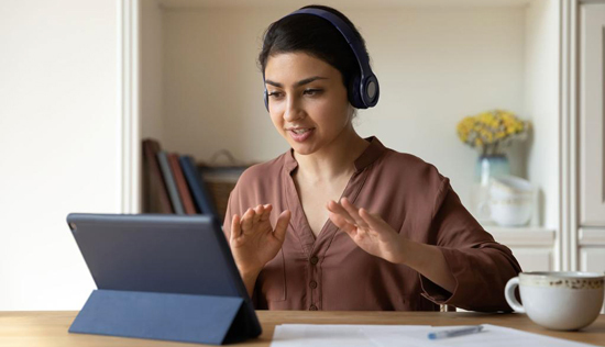 Female student on virtual call, courtesy of Adobe Stock.