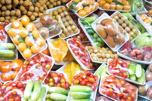 Fruits and vegetables packed in plastic.  Image courtesy of Adobe Stock